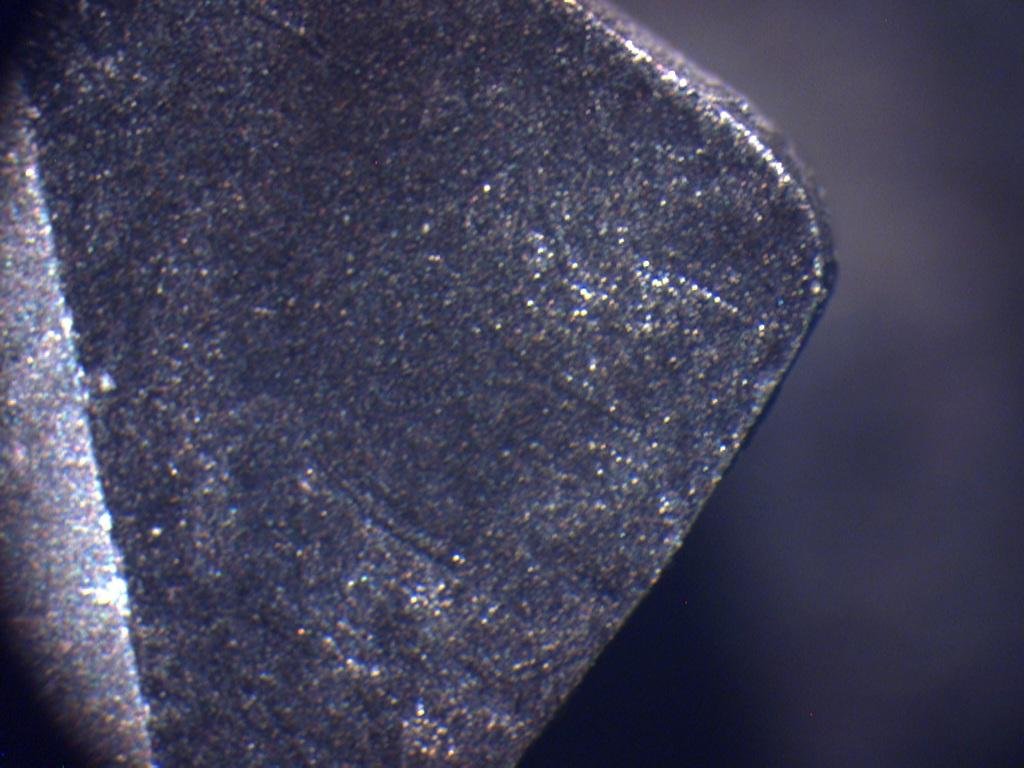 Close-up of a Polycrystalline tipped insert with tool wear